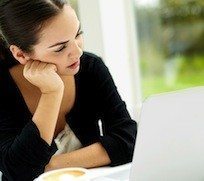 Girl In Black At Computer